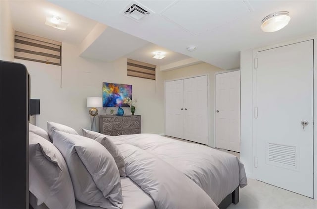 bedroom featuring visible vents