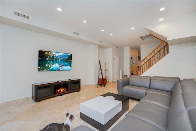 tiled living room with a fireplace