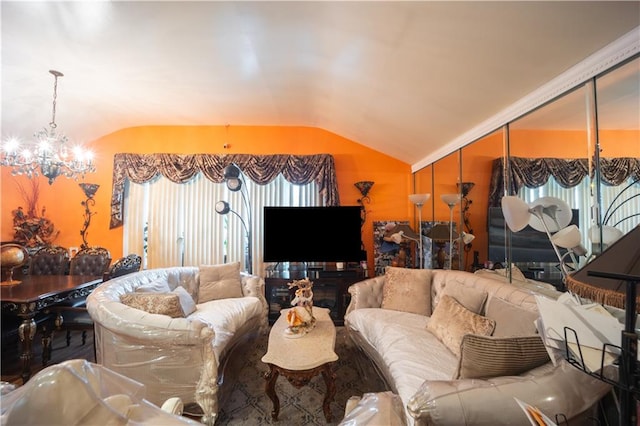 living room featuring vaulted ceiling and an inviting chandelier