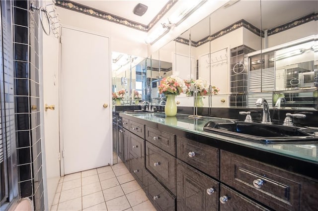 bathroom featuring vanity and tile patterned flooring