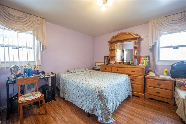 bedroom featuring hardwood / wood-style floors