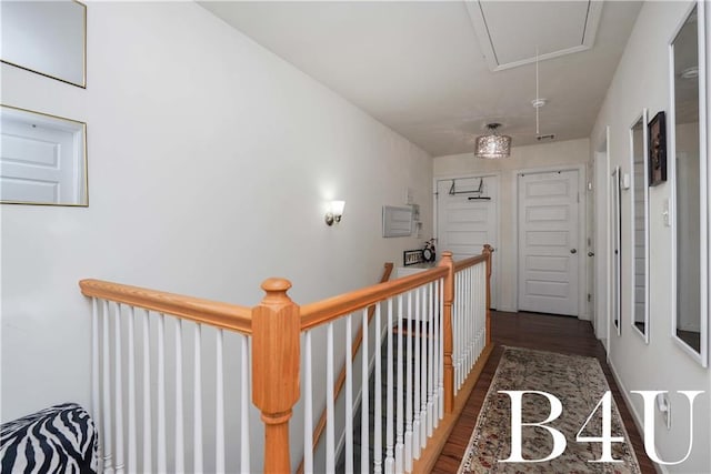 hall with dark hardwood / wood-style floors