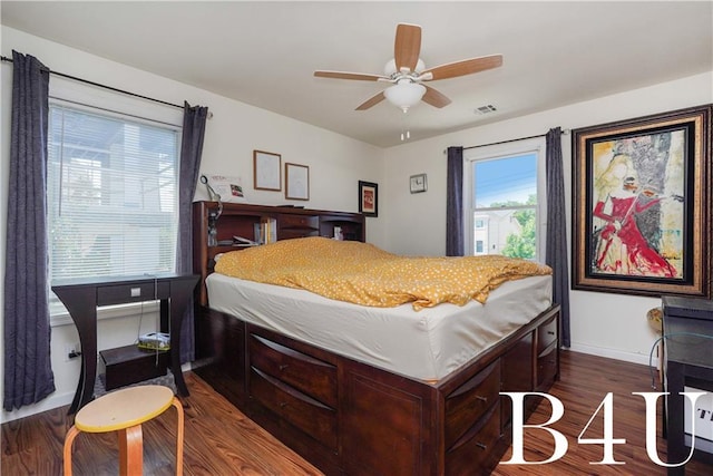 bedroom featuring dark wood-type flooring, visible vents, ceiling fan, and baseboards
