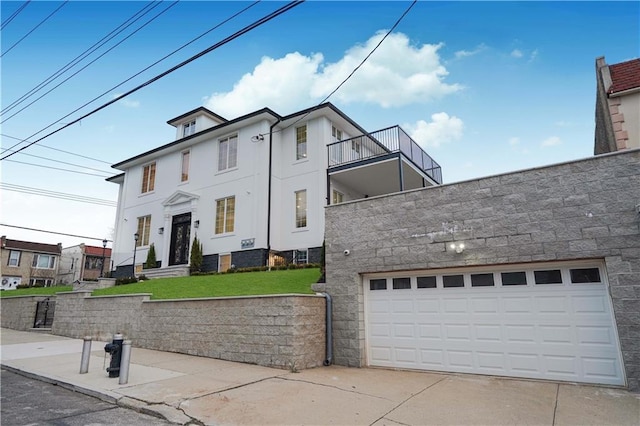 view of front of property with a garage