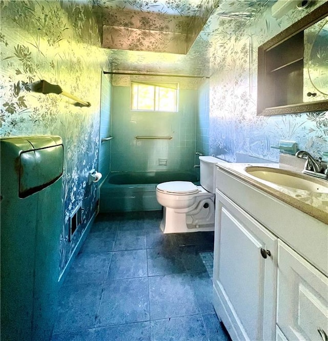 bathroom featuring vanity, wallpapered walls, shower / bath combination, tile patterned floors, and toilet