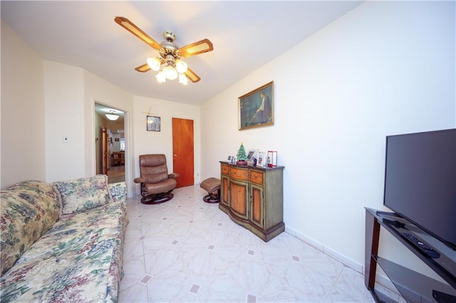 living room featuring ceiling fan