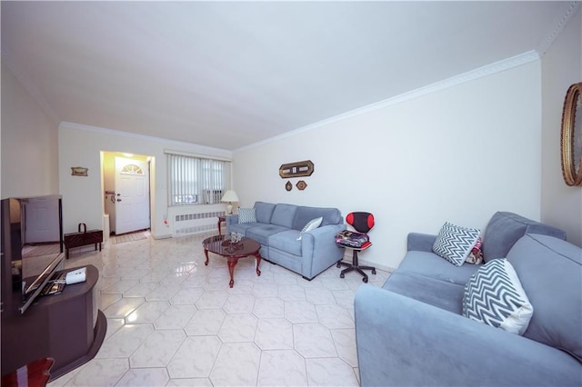 living room with crown molding and radiator