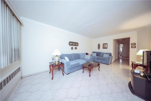 living room with radiator heating unit and ornamental molding