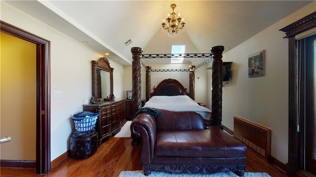 bedroom with lofted ceiling, dark hardwood / wood-style floors, and a notable chandelier