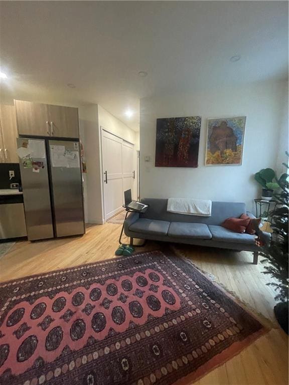 living room with light hardwood / wood-style floors