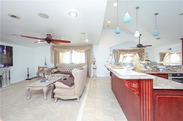 tiled living room featuring vaulted ceiling