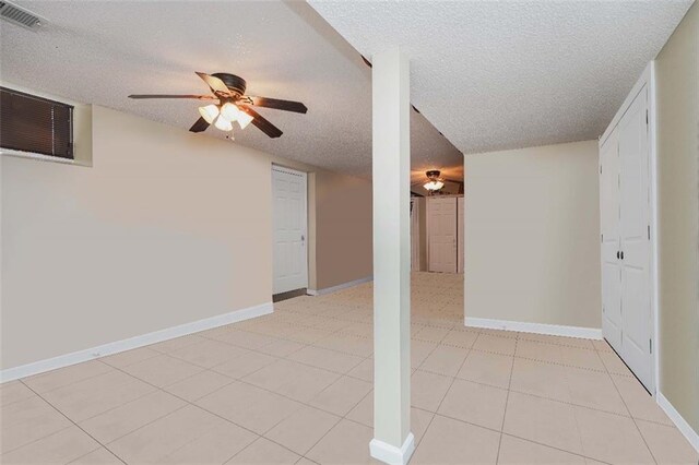 basement with a textured ceiling