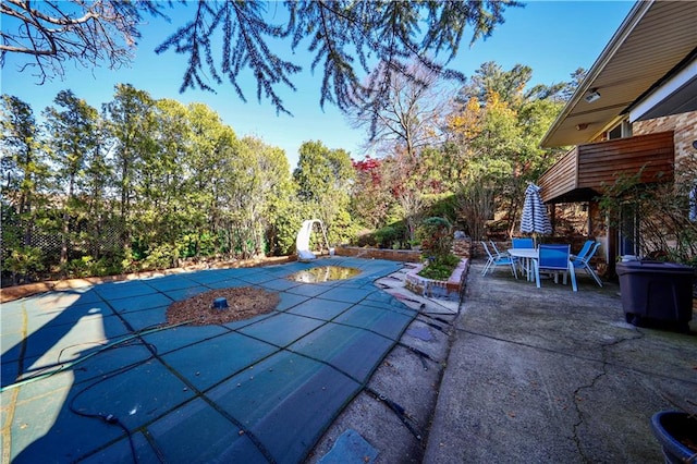 view of pool with a patio area