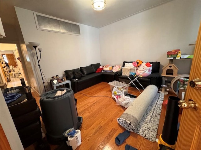 living room with hardwood / wood-style floors