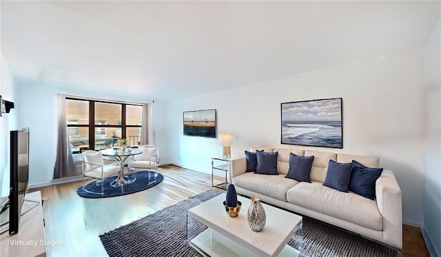 living area with light wood-style floors