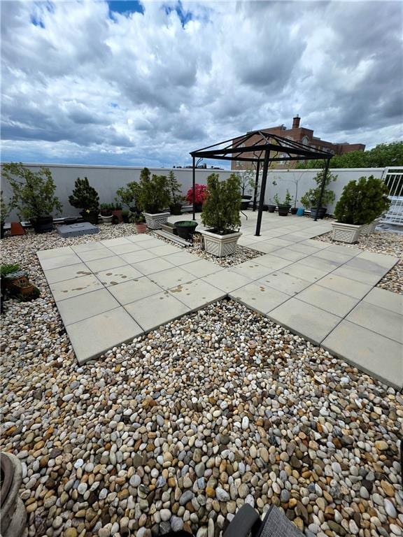 1927 78th St Unit 4A, Brooklyn, NY 11214 - fenced backyard with a pergola and a patio area
