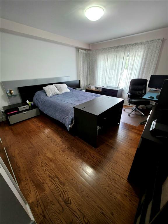 1927 78th St Unit 4A, Brooklyn, NY 11214 - bedroom featuring wood finished floors and an office area