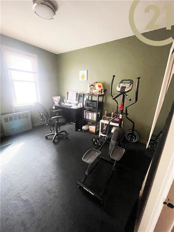 miscellaneous room featuring hardwood / wood-style flooring