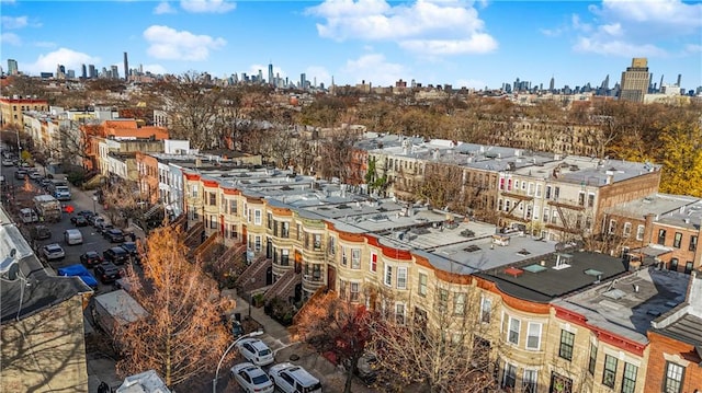 drone / aerial view featuring a city view