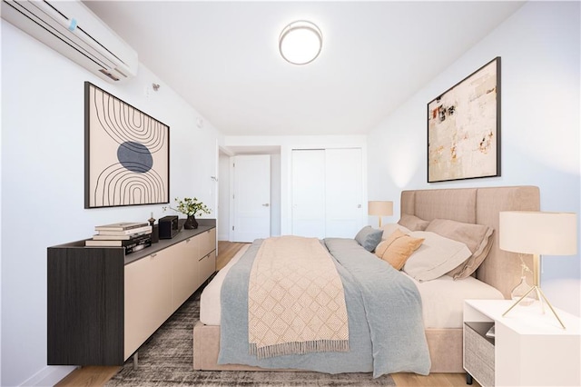 1722 84th St Unit 203, Brooklyn, NY 11214 - bedroom with a wall mounted air conditioner, wood finished floors, and a closet