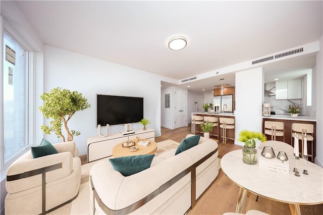 1722 84th St Unit 203, Brooklyn, NY 11214 - living area featuring light wood-style floors