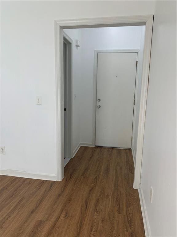 1738 79th St, Brooklyn, NY 11214 - corridor with wood finished floors and baseboards
