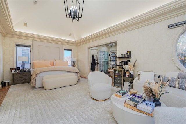 bedroom with a chandelier, a raised ceiling, and crown molding