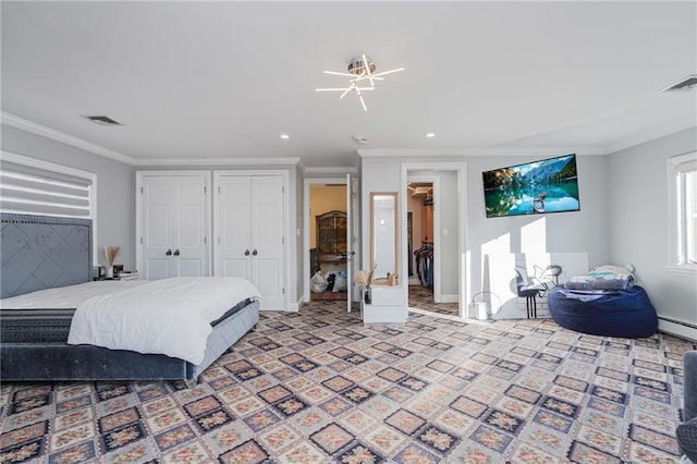 bedroom with ornamental molding and a baseboard radiator