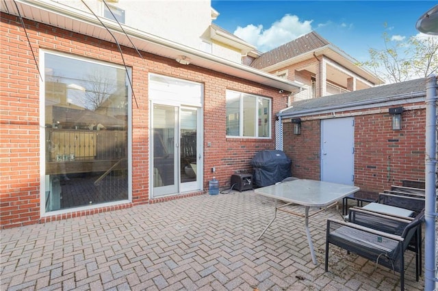 view of patio with a grill