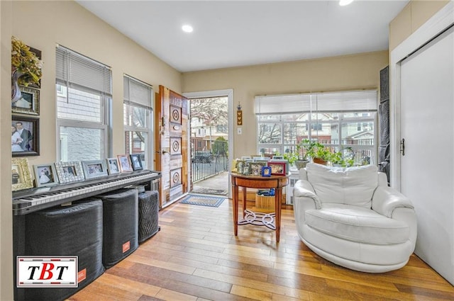 sitting room featuring recessed lighting and wood-type flooring