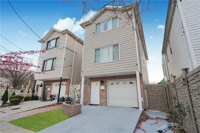 view of front of property with a garage