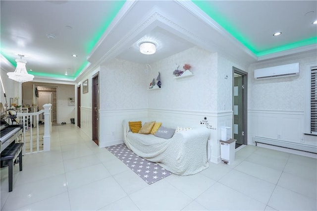 interior space with light tile patterned floors, crown molding, a baseboard radiator, and a wall mounted AC