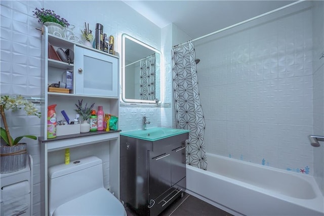 full bathroom featuring vanity, tile patterned flooring, shower / bath combination with curtain, and toilet