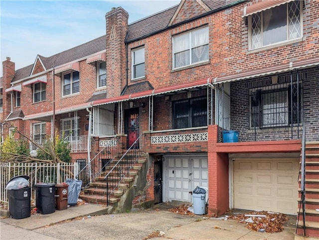 view of front of property featuring a garage