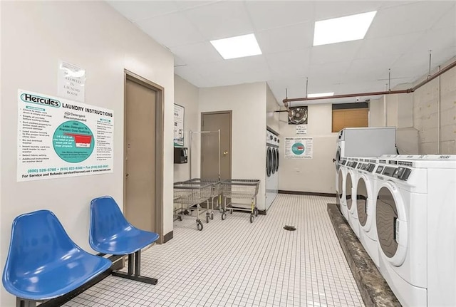 laundry room with stacked washer and dryer