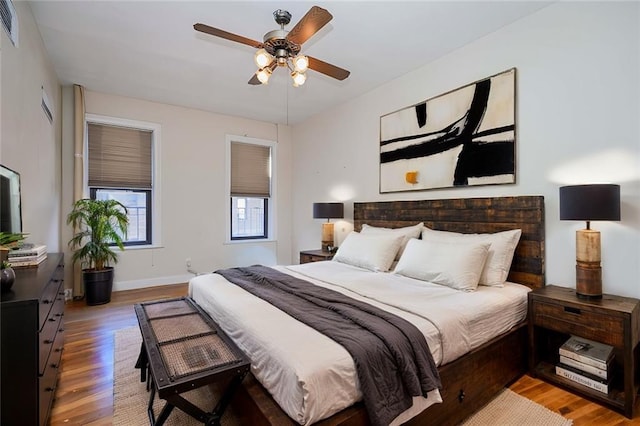 7101 Colonial Rd Unit L5I, Brooklyn, NY 11209 - bedroom with wood finished floors, baseboards, and a ceiling fan