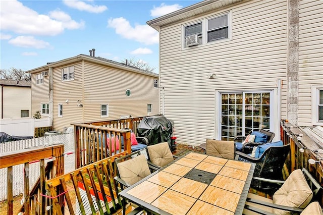 rear view of property with a deck