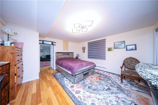 bedroom with wood-type flooring