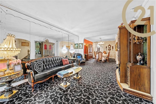 carpeted living room with a chandelier