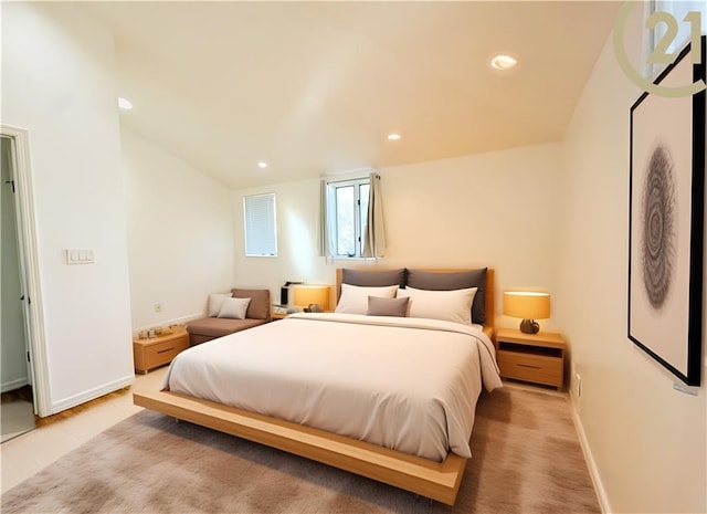 bedroom with recessed lighting and baseboards