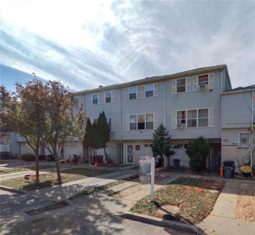 multi unit property featuring brick siding