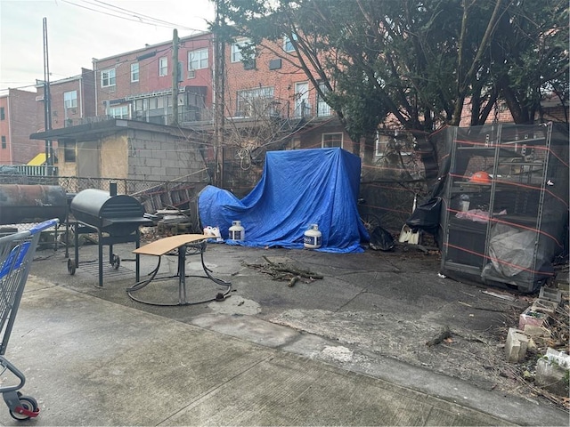 view of patio featuring a grill