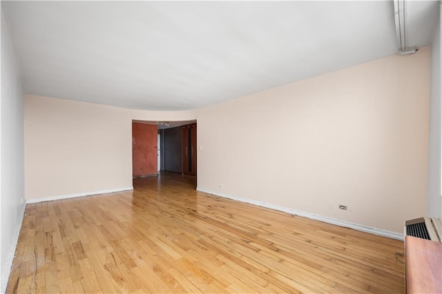 empty room featuring light hardwood / wood-style floors