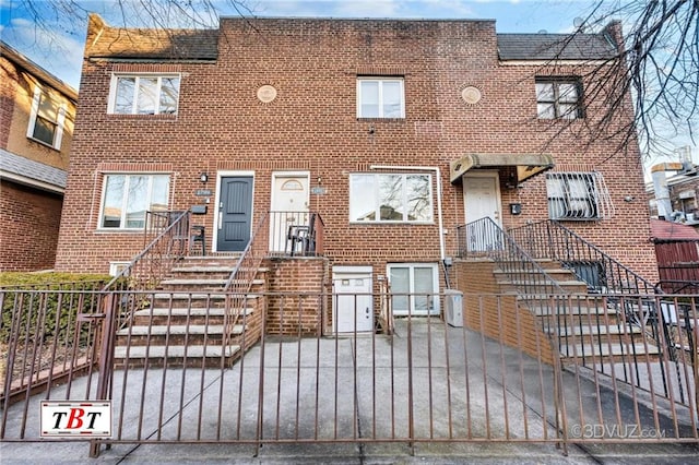 1801 E 7th St, Brooklyn, NY 11223 - townhome / multi-family property with a fenced front yard and brick siding