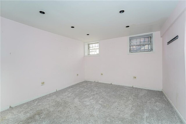 spare room with light colored carpet