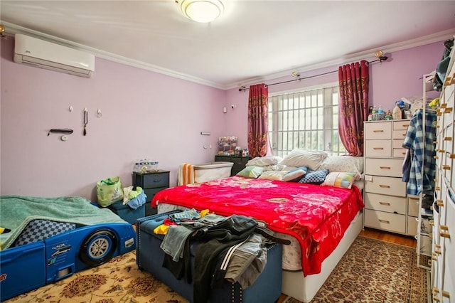 bedroom featuring crown molding, dark hardwood / wood-style floors, and a wall mounted air conditioner