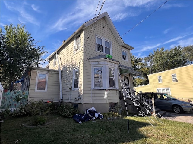 view of front of house with a front yard