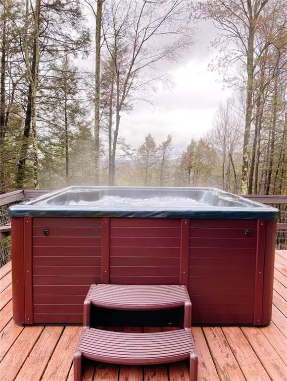 deck with a hot tub