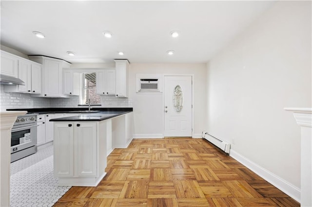 kitchen with white cabinets, electric range, sink, and a baseboard heating unit