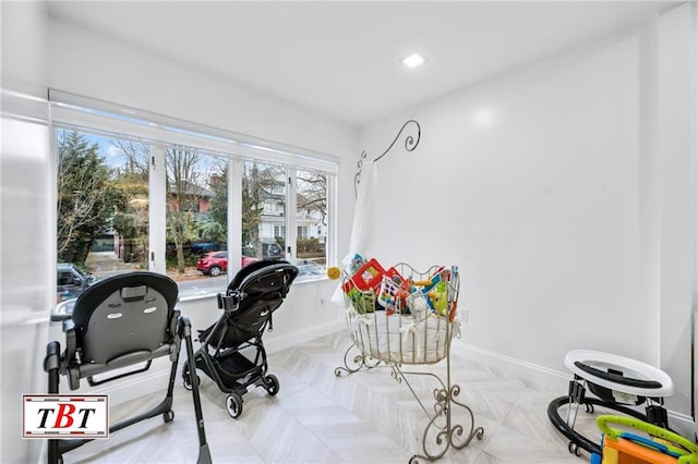 interior space featuring recessed lighting and baseboards